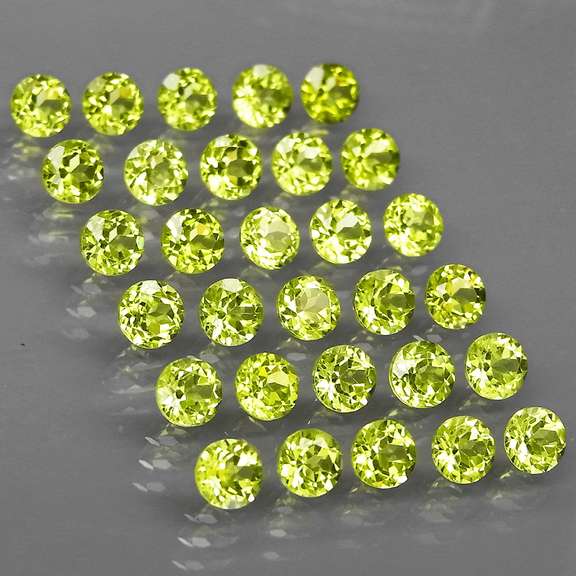 High grade 9.05ct untreated apple green Peridot set