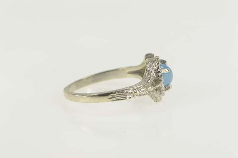 14K White Gold Oval Syn. Star Sapphire Vine Leaf Bypass Ring