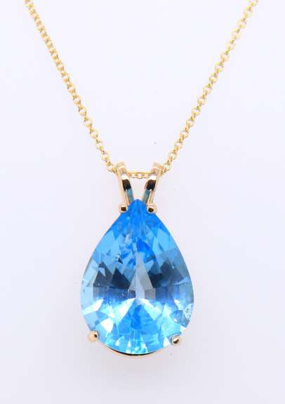 Gorgeous Yellow Gold Pear Shaped Blue Topaz Pendant on Chain