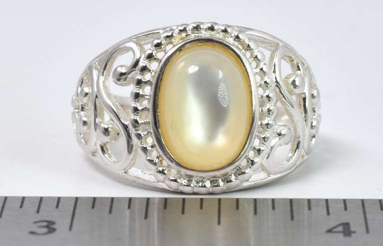 Sterling Silver Ring With An Iridescent Stone