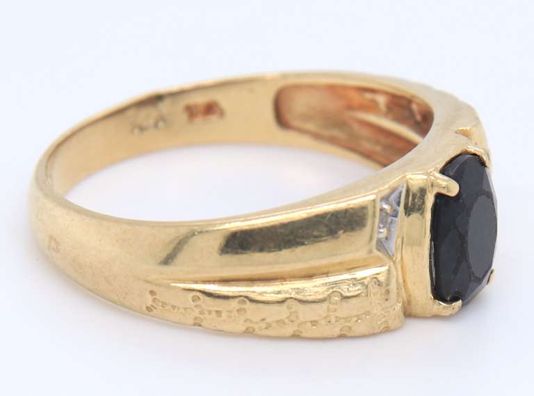 Attractive Yellow Gold Black Onyx and Diamond Ring