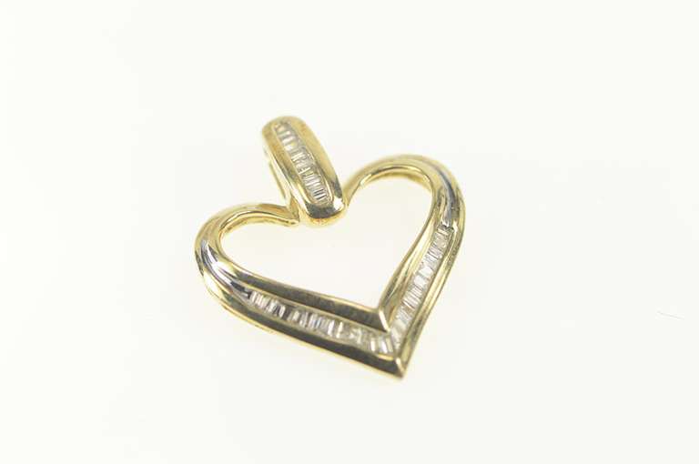 10K Yellow Gold 0.20 Ctw Diamond Baguette Heart Symbol Pendant