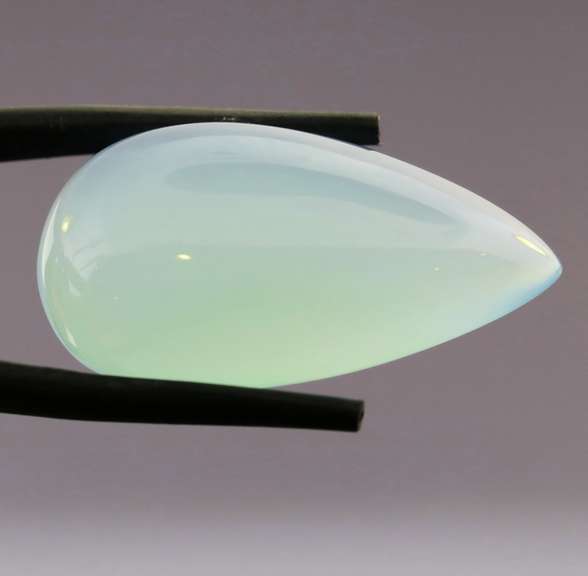 Glowing 27.53ct untreated pear Chalcedony cabochon