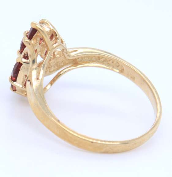 Fancy Yellow Gold 8 Stone Rubies Ring