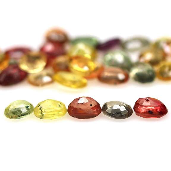Heated only! 7.53ct fancy color Sapphire set