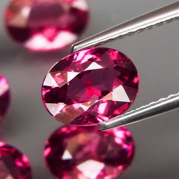 Ravishing 9.34ct violet pink Rhodolite Garnet set