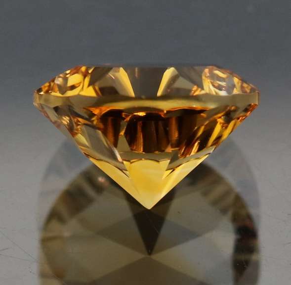 Fiery 3.06ct concave cut Citrine solitaire