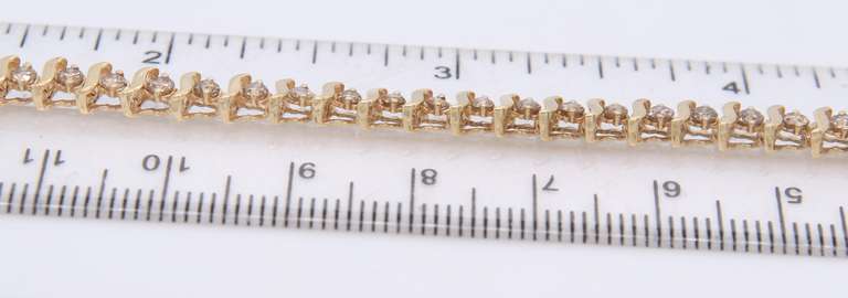 Gorgeous Yellow Gold Diamond S Tennis Bracelet