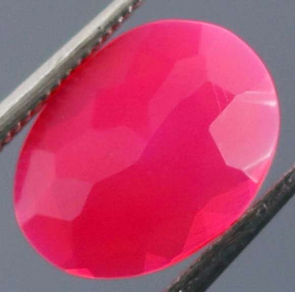 Captivating 1.11ct pink Opal with flashing