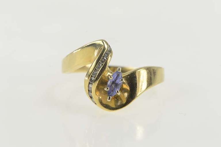 14K Yellow Gold Marquise Tanzanite Diamond Wavy Design Ring