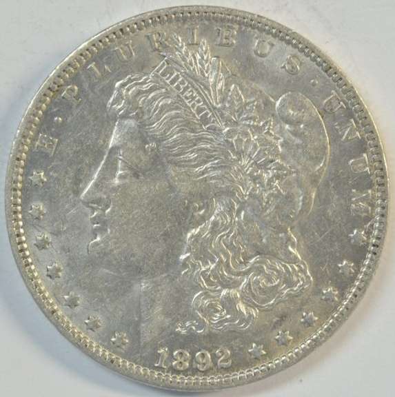Near Mint lustrous 1892-O Morgan Silver Dollar. Better date