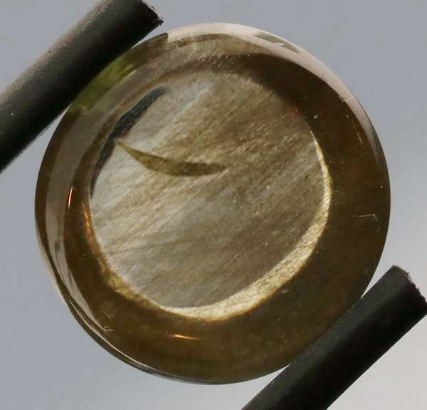 Gorgeous 4.86ct round cut Scapolite cabochon