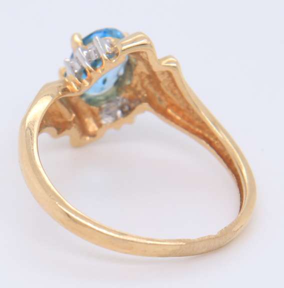 Fantastic Yellow Gold Blue Topaz and Diamond Ring
