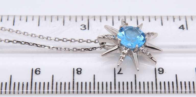 925 Sterling Silver Light Blue Cubic Zirconia Sun Pendant on Chain Necklace