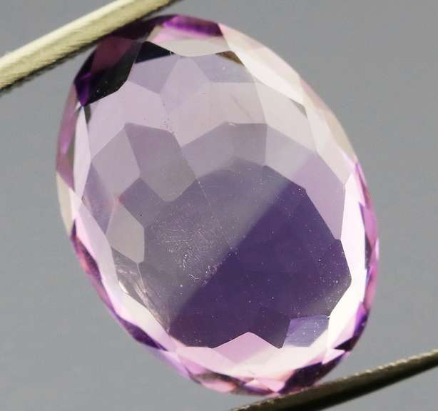 Glittering oval cut 8.35ct violet Amethyst