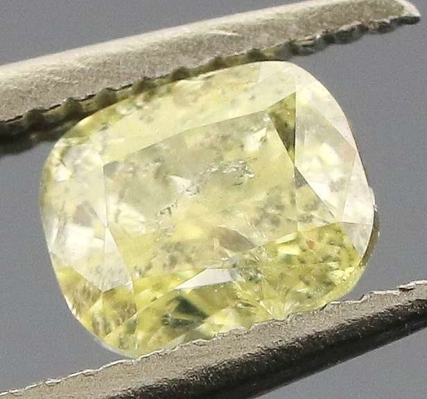 Rare .32ct cushion cut canary yellow Diamond