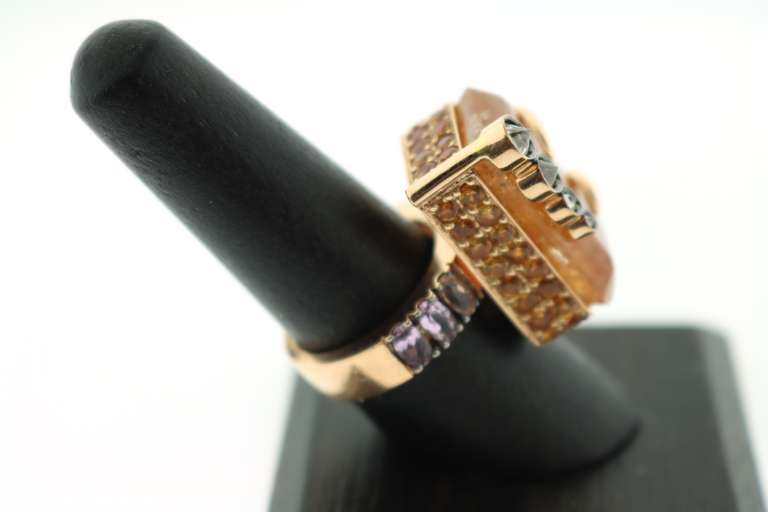 Massive Golden Rutilated Quartz Chunk 18k Gold Ring with Poked Diamonds and Rimmed with Elegants Pink Sapphires