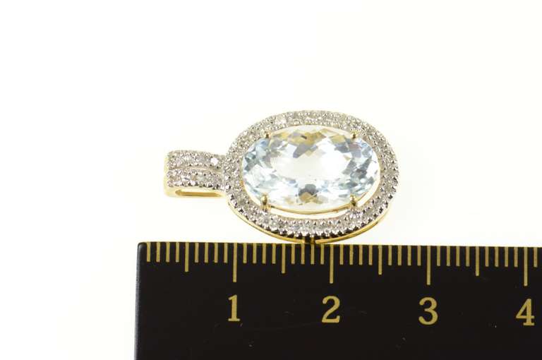 14K Yellow Gold Oval Blue Topaz Diamond Halo Statement Pendant