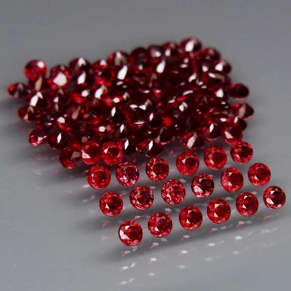 Incredible 7.02ct open color Pyrope Garnet set
