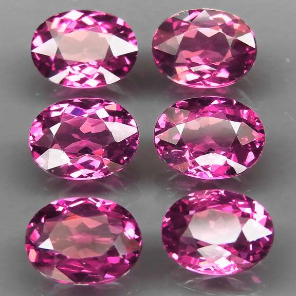Remarkable 8.61ct violet pink Rhodolite Garnet set