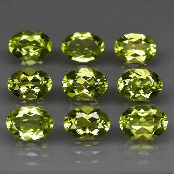 Dazzling 7.33ct untreated apple green Peridot set