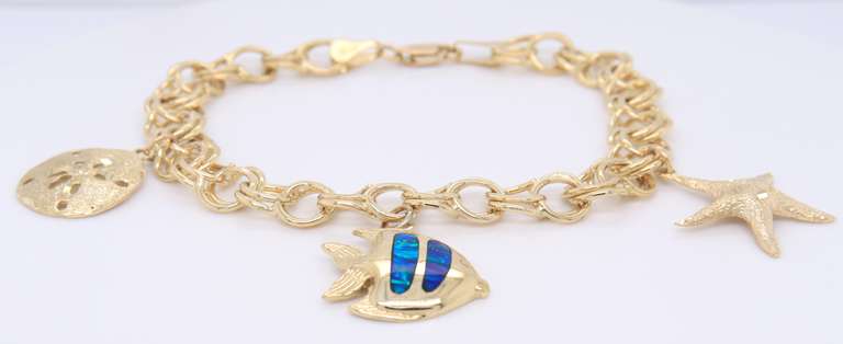 Incredible Yellow Gold Charm Bracelet with 3 Charms