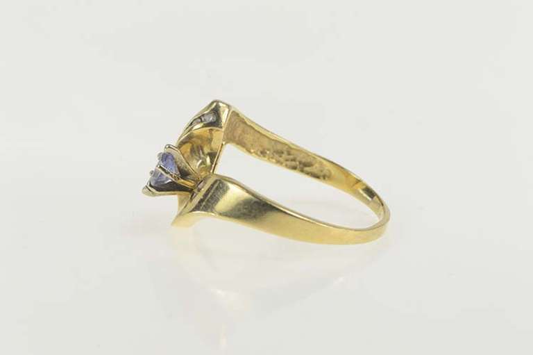 14K Yellow Gold Marquise Tanzanite Diamond Wavy Design Ring