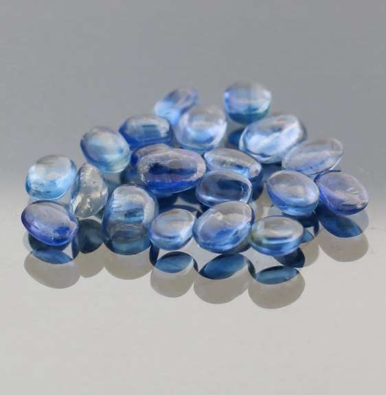Excellent 11.44ct sapphire blue Kyanite cabochon set