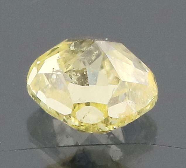 Glittering .36ct cushion cut yellow Diamond