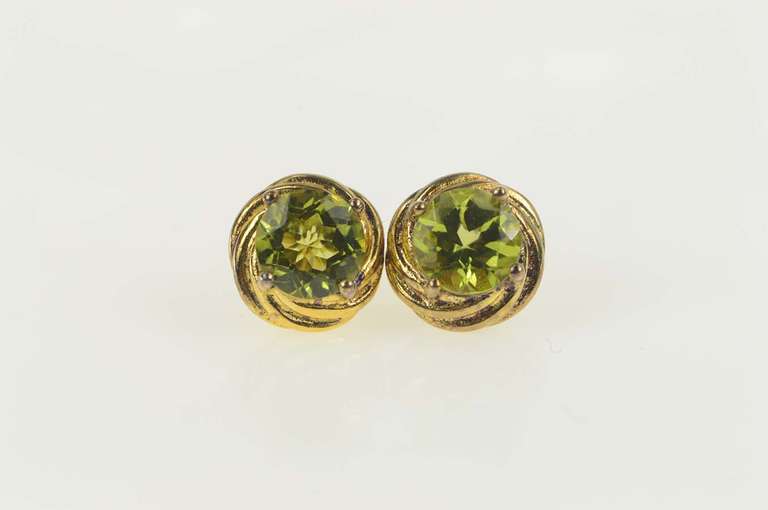 Sterling Silver Round Peridot Twist Design Statement Stud Earrings