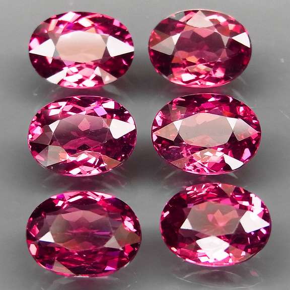Ravishing 9.34ct violet pink Rhodolite Garnet set