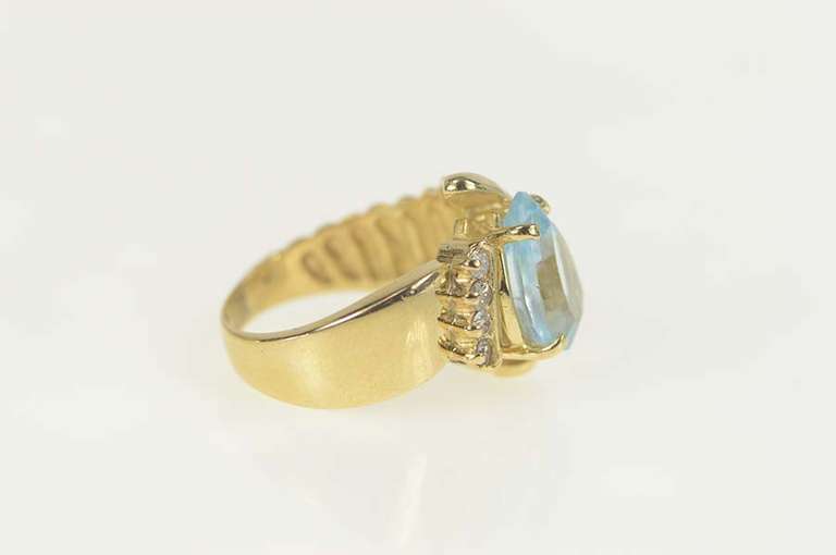 14K Yellow Gold 3.65 Ctw Pear Blue Topaz Diamond Accent Ring
