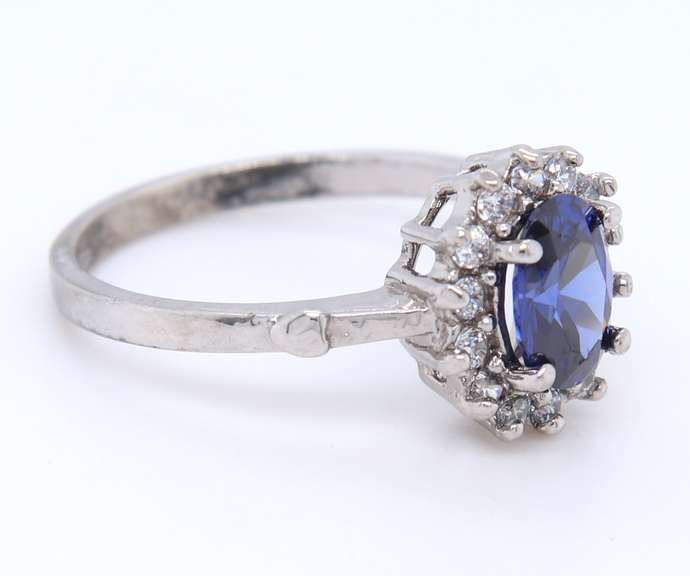 Charming White Gold Tanzanite and Diamond Halo Ring