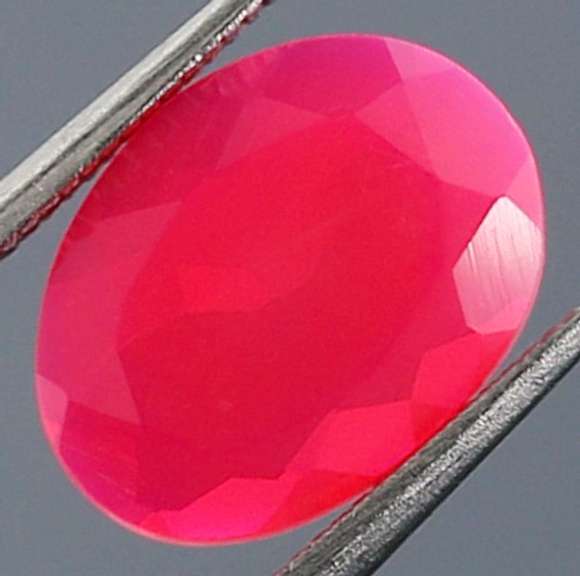 Captivating 1.11ct pink Opal with flashing
