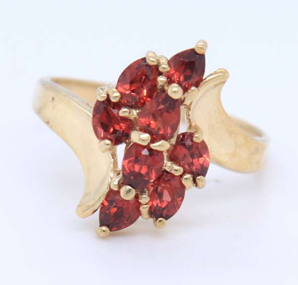 Fancy Yellow Gold 8 Stone Rubies Ring
