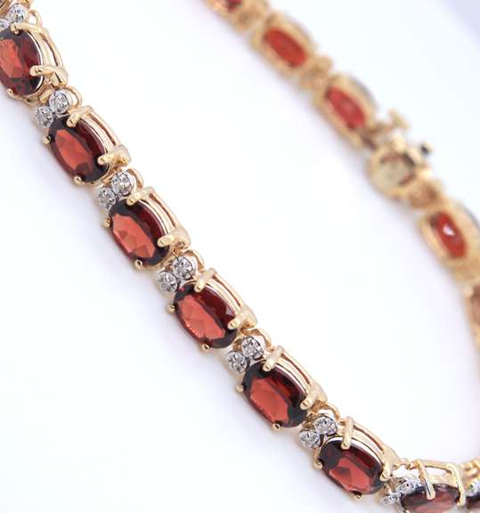 Wonderful Yellow Gold oval Garnet and Diamond Bracelet