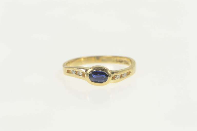 14K Yellow Gold Sapphire Diamond Accent Wavy Engagement Ring