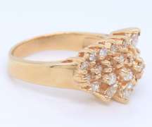 Handsome Marquoise and Round Cut Diamond Cluster Ring
