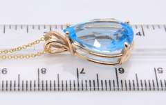 Gorgeous Yellow Gold Pear Shaped Blue Topaz Pendant on Chain