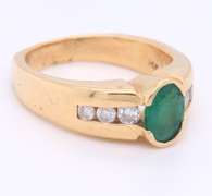 Incredible Yellow Gold oval Cut Emerald and Diamond Ring