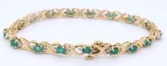 Handsome Yellow Gold Emerald and Diamond Tennis Bracelet