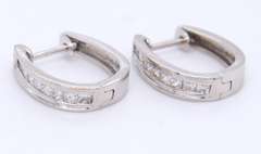 Dazzling White Gold Channel Set Princess Cut Diamond Earrings