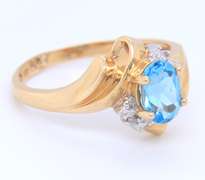 Fantastic Yellow Gold Blue Topaz and Diamond Ring
