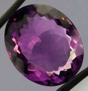 Substantial oval cut 21.43ct violet Amethyst