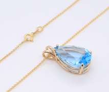 Gorgeous Yellow Gold Pear Shaped Blue Topaz Pendant on Chain