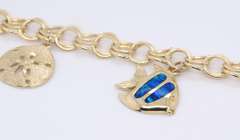 Incredible Yellow Gold Charm Bracelet with 3 Charms