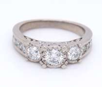 Stunning White Gold 1.25ctw 3 Diamond Ring w Channel Set Sides