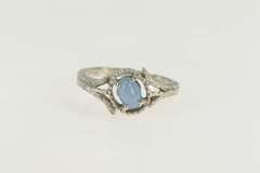 14K White Gold Oval Syn. Star Sapphire Vine Leaf Bypass Ring
