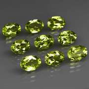 Dazzling 7.33ct untreated apple green Peridot set