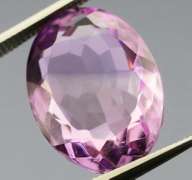 Glittering oval cut 8.35ct violet Amethyst